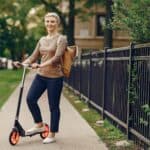 woman with kick scooter